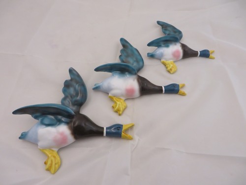 Set three flying ducks - of,